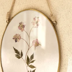 Cadre décoratif ovale avec fleurs séchées - doré