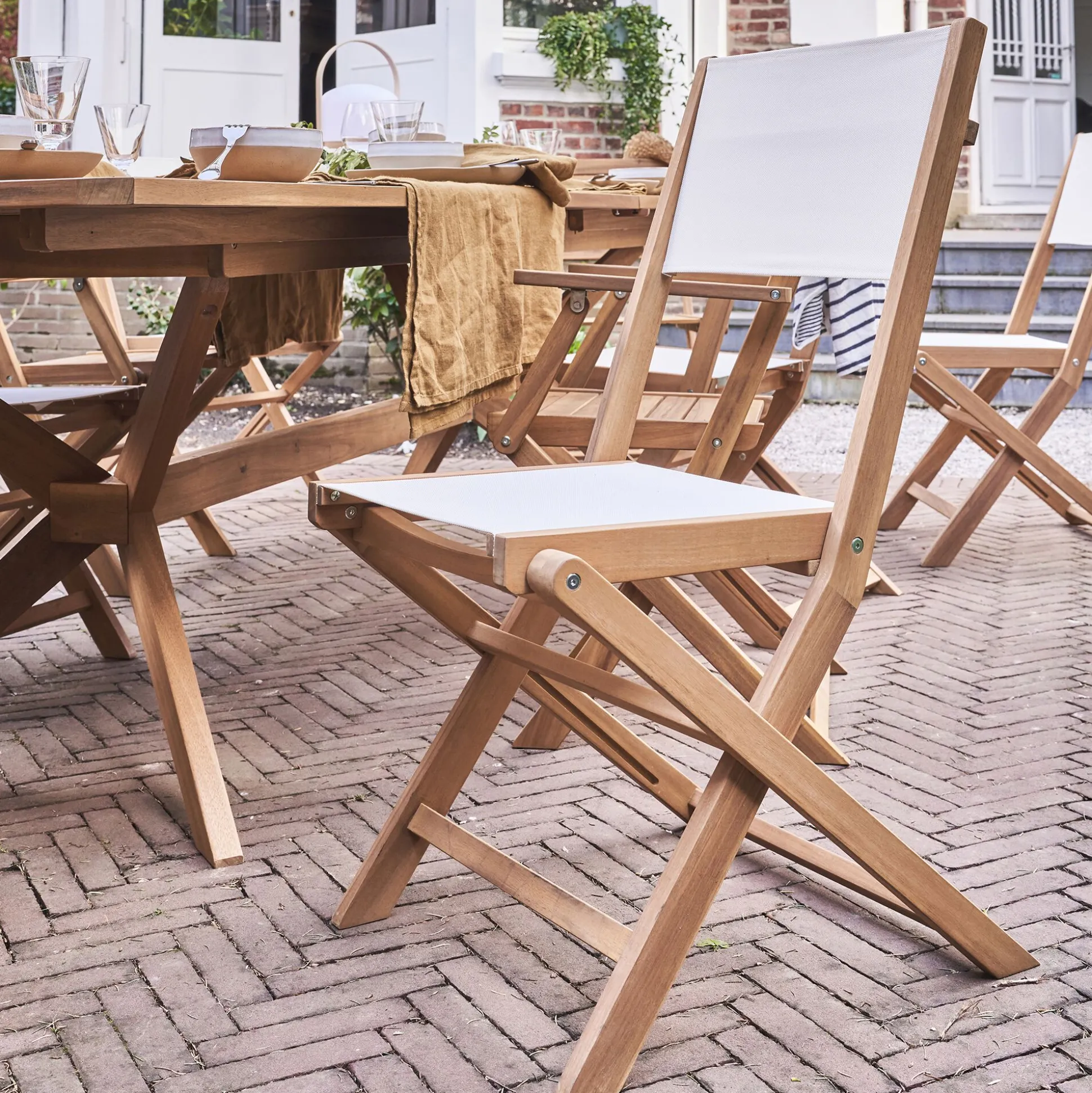 Chaise de jardin pliante en acacia huilé et tissu - blanc