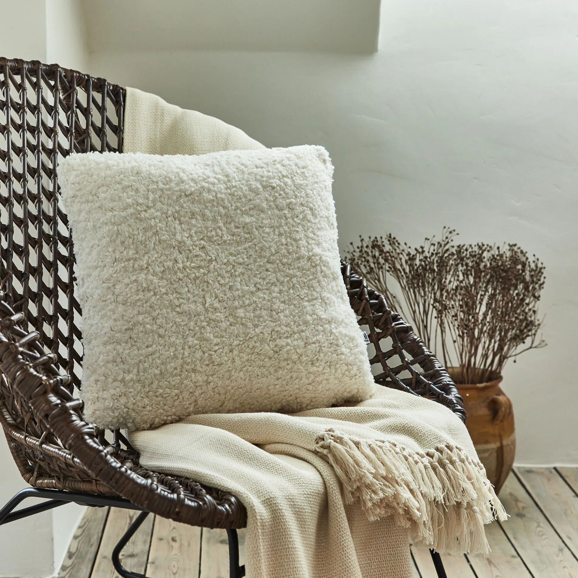 Coussin effet moutonné synthétique 45x45cm - blanc