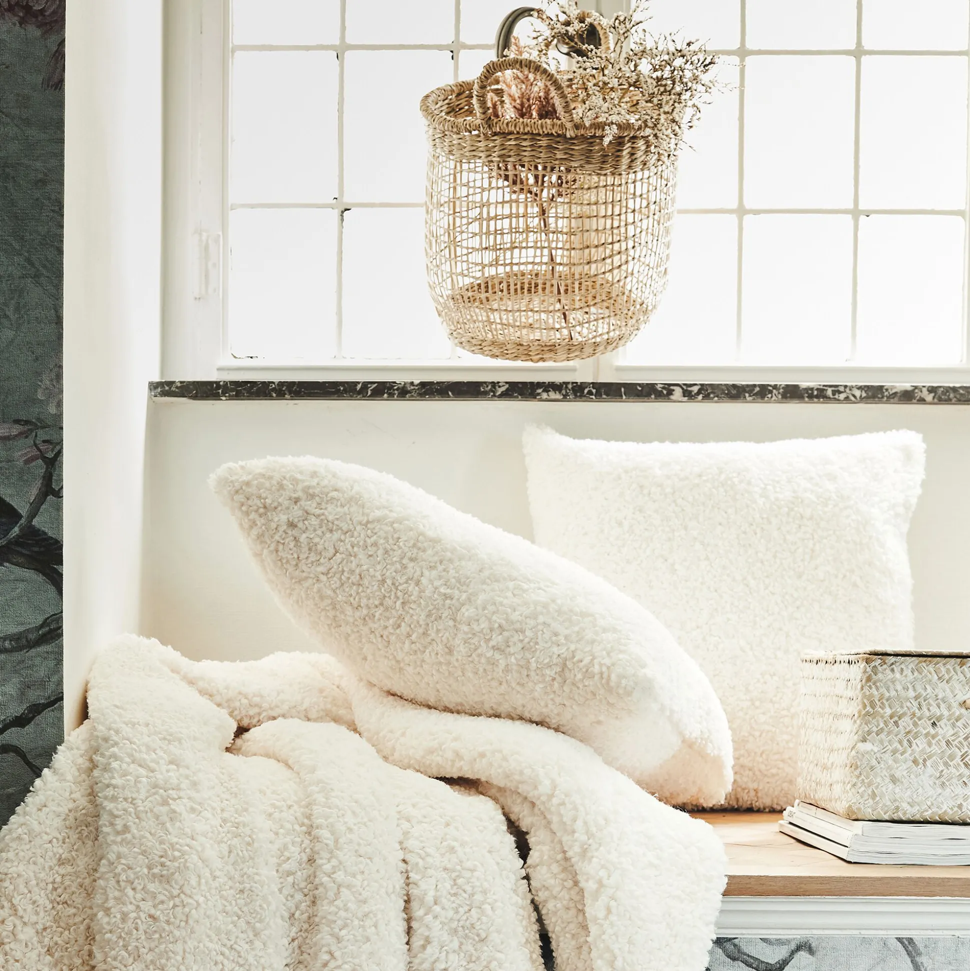 Coussin effet moutonné synthétique 45x45cm - blanc