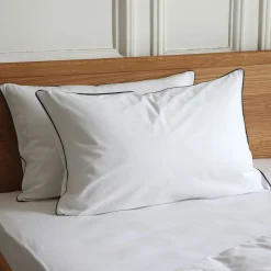Lot de 2 taies d'oreiller en percale de coton 50x70cm avec liseré tressé gris calabrun - blanc
