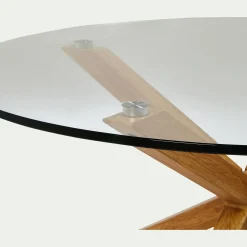 Table basse ronde en verre et piétement métal effet bois - transparent